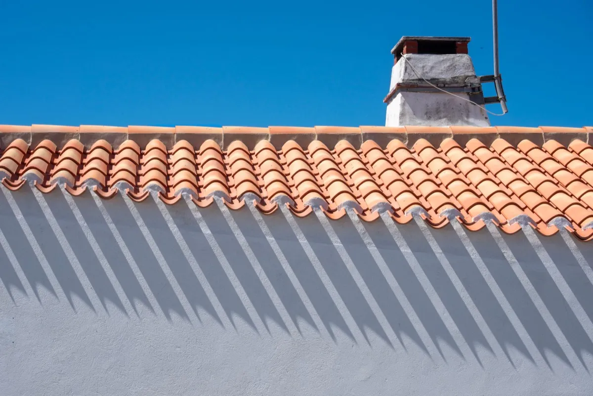 Roof ridge line and chimney on a home in Abilene, TX